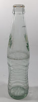 Mirinda 8 3/4" Tall 237mL Embossed Clear Glass Soda Pop Bottle
