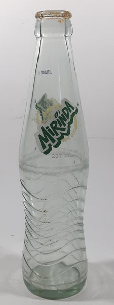 Mirinda 8 3/4" Tall 237mL Embossed Clear Glass Soda Pop Bottle