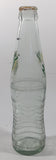 Mirinda 8 3/4" Tall 237mL Embossed Clear Glass Soda Pop Bottle