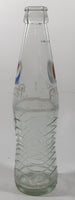 Pepsi 8 3/4" Tall 237mL Embossed Clear Glass Soda Pop Bottle