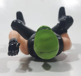Black and Green Character with Helmet In Riding Pose 3 3/4" Tall Toy Figure