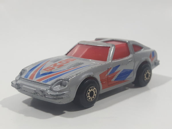 Vintage 1983 Matchbox Mega Blasters Cap Cars Datsun 280Z Bomb Silver Grey Die Cast Toy Car Vehicle
