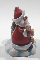 Santa Claus with Teddy Bear and Drum 3 1/4" Tall Resin Candle Holder
