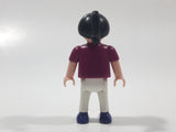 1995 Geobra Playmobil Girl with Black Hair in Purple Top and White Pants 2" Tall Toy Figure