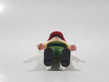 1992 Geobra Playmobil Boy with Black Hair Red Cap in Cream Vest and Green Top and Green Pants 2 1/8" Tall Toy Figure