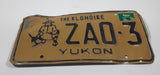1989 Yukon The Klondike Man Panning Gold Themed Yellow Metal Vehicle License Plate Tag ZA0 3
