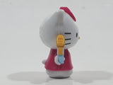 2018 Sanrio Hello Kitty with Paint Brushes 1 3/4" Tall Plastic Toy Figure