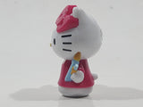 2018 Sanrio Hello Kitty with Paint Brushes 1 3/4" Tall Plastic Toy Figure
