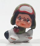 Vintage 1979 Sekiguchi Monchichi Girl in Airplane 1 3/4" Tall PVC Toy Figure