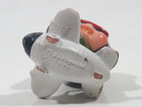 Vintage 1979 Sekiguchi Monchichi Girl in Airplane 1 3/4" Tall PVC Toy Figure