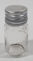 Vintage T-22 2 1/2" Tall Clear Glass Medicine Bottle with Metal Lid