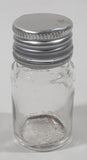 Vintage T-22 2 1/2" Tall Clear Glass Medicine Bottle with Metal Lid