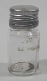 Vintage T-22 2 1/2" Tall Clear Glass Medicine Bottle with Metal Lid