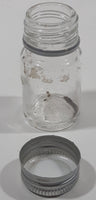 Vintage T-22 2 1/2" Tall Clear Glass Medicine Bottle with Metal Lid
