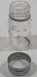Vintage T-22 2 1/2" Tall Clear Glass Medicine Bottle with Metal Lid