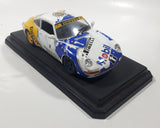 Burago Porsche 911 Carrera Racing #1 Pirelli Mobil White 1/24 Scale Die Cast Toy Car Vehicle with Opening Doors and Rear Hood on Base