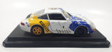 Burago Porsche 911 Carrera Racing #1 Pirelli Mobil White 1/24 Scale Die Cast Toy Car Vehicle with Opening Doors and Rear Hood on Base