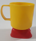 Vintage 1985 McDonald's Ronald McDonald Footed Yellow and Red Plastic Cup Mug with Feet