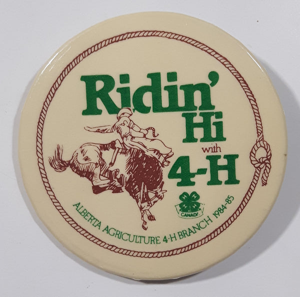 1984-85 Alberta Agriculture 4-H Branch Ridin' Hi with 4-H 2 1/4" Round Button Pin